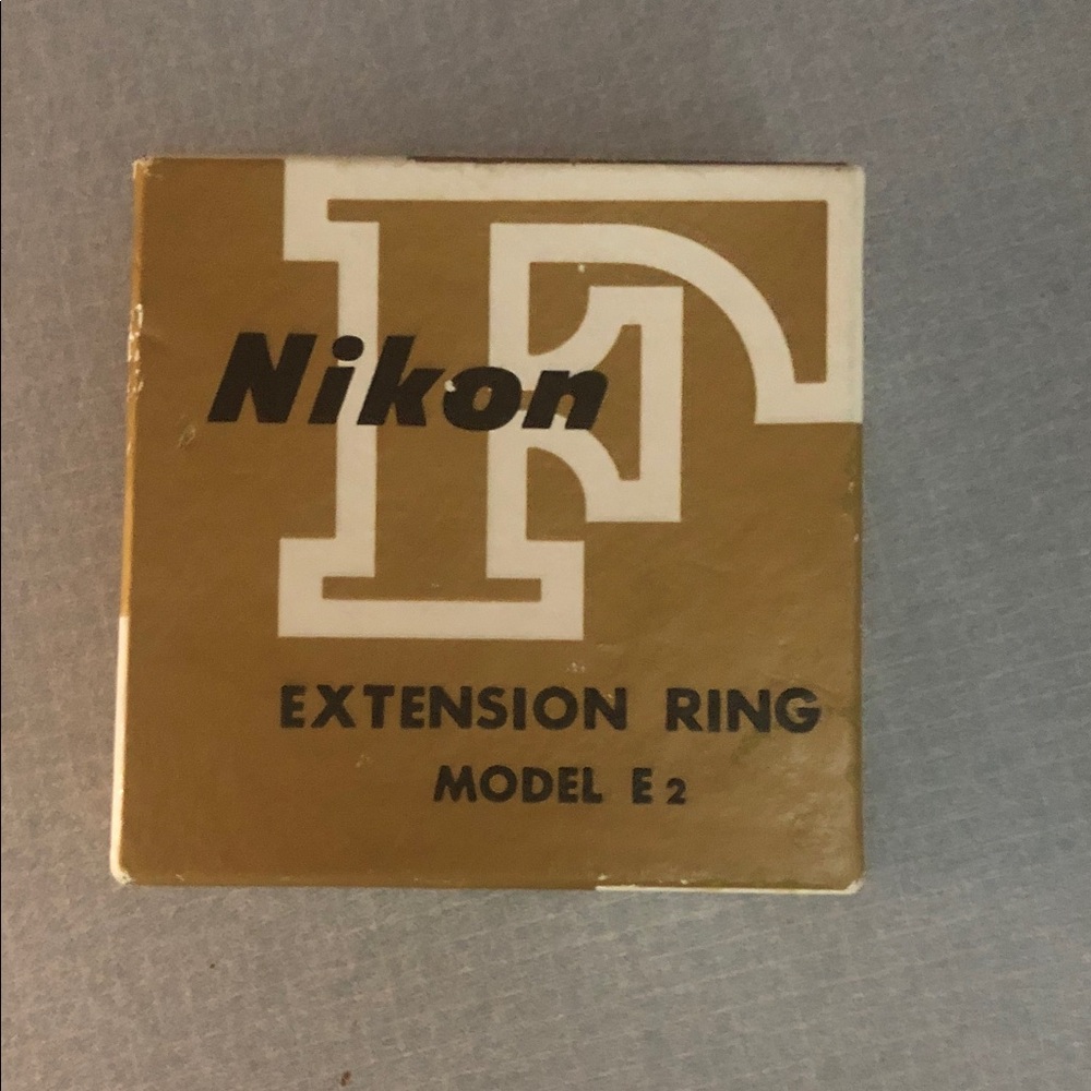 Nikon Extension Ring Box in Gold and White
